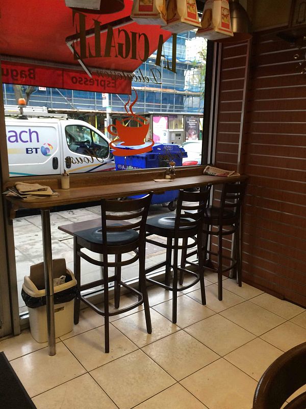 Window seating inside La Cigale looking out onto Lower Road