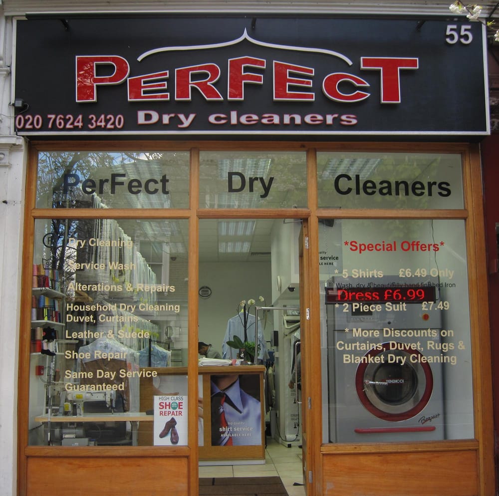 Close view of Perfect Dry Cleaners shopfront and window services