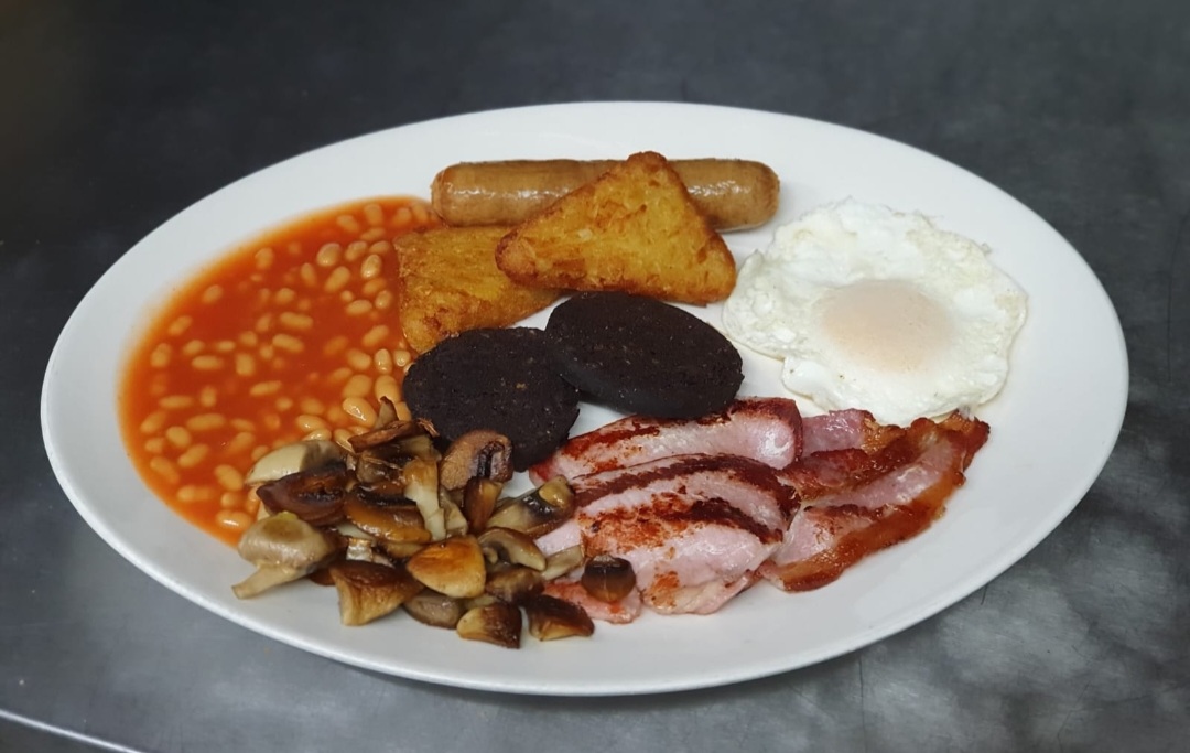 Full English breakfast with black pudding and hash browns